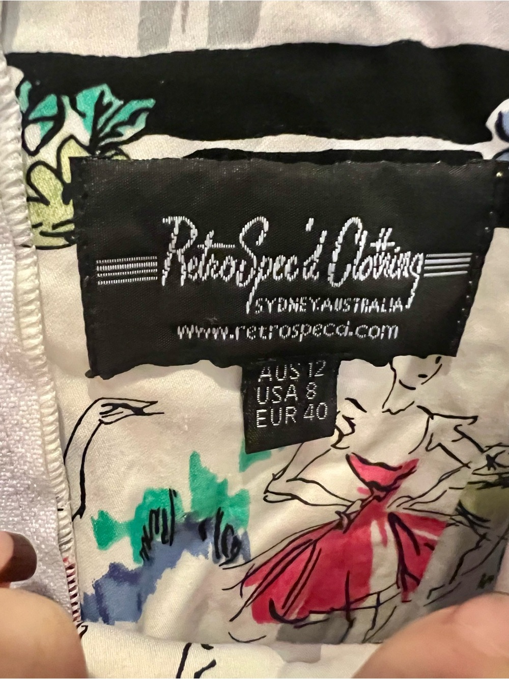 RetroSpec'd Clothing Women's White Printed Dress with black multi dancer Accents